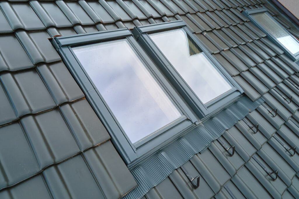 Winter Comfort in Melbourne Homes: How Skylights Improve Light Without Compromising Warmth 4 closeup of attic window on house roof top covered 2024 12 06 04 18 07 utc