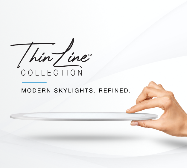 Solatube Thin Line diffuser, an ultra-slim round skylight diffuser, held in one hand